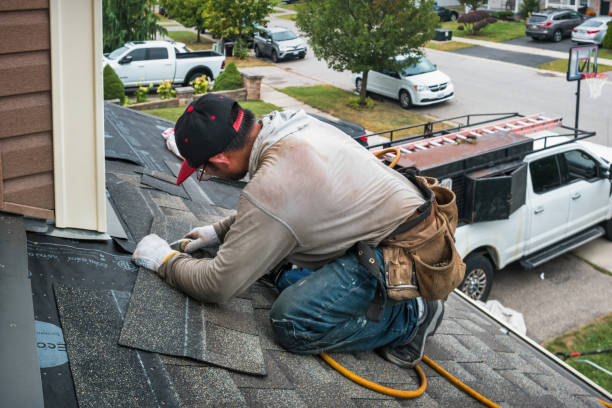 Professional Roofing technician working in Waverley, MA